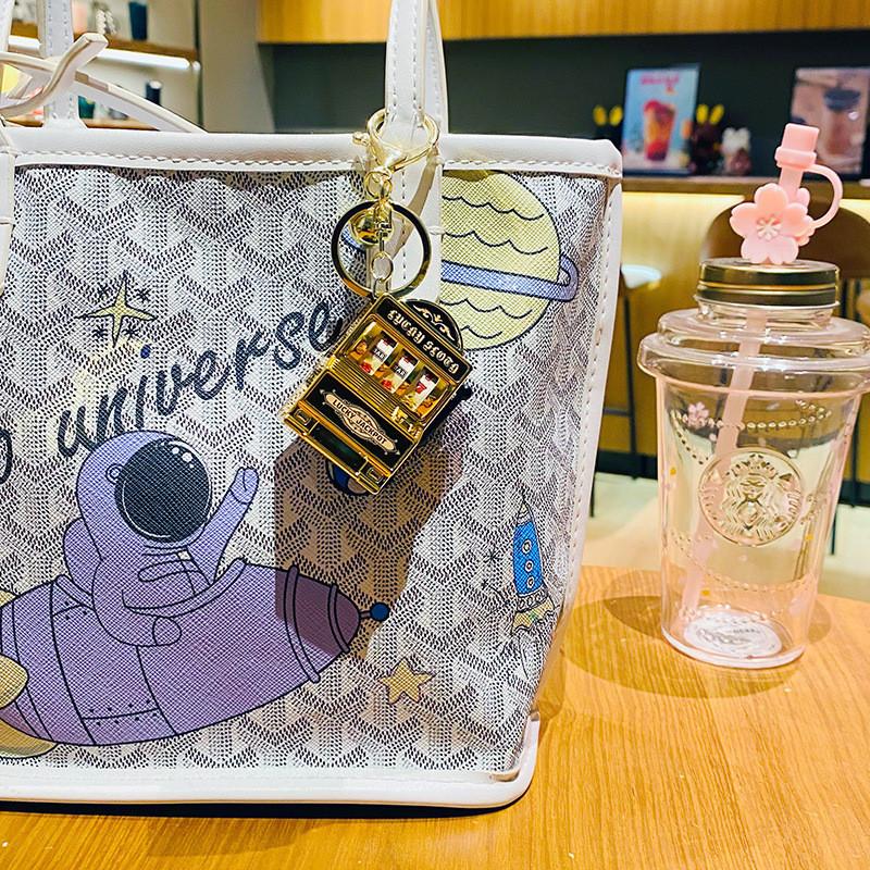 Delightful Gold And Silver Fruit Machine Keychain Thoughtful Gift For Any Occasion