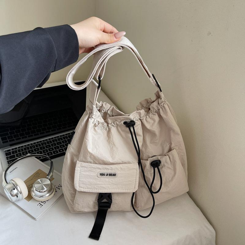 

Вместительная сумка-ведро на кулиске для женщин, новая модная сумка-кроссбоди через плечо, повседневная сумка с несколькими карманами на кулиске .