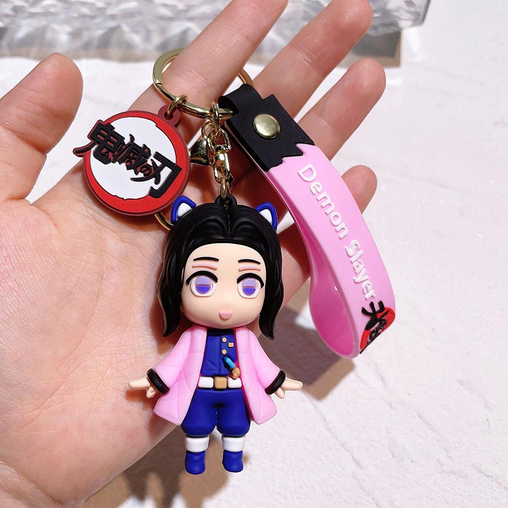 

New Demon Slayer Nezuko Kamado Tanjiro Tomioka Giyuu Kochou Shinobu Hashibira Inosuke keychain anime doll decorative pendant