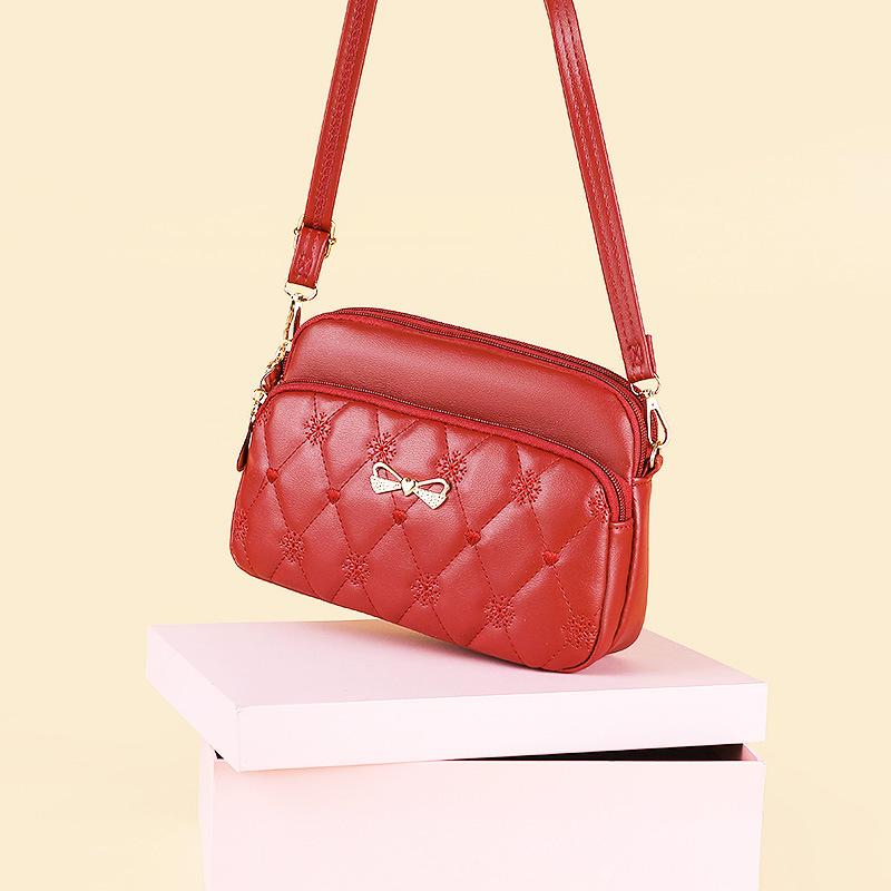 

Корейская нишевая сумка подмышку Новый стиль Сумка через плечо с бантом Большой вместимости Женская сумка для мобильного телефона 23*7*16CM