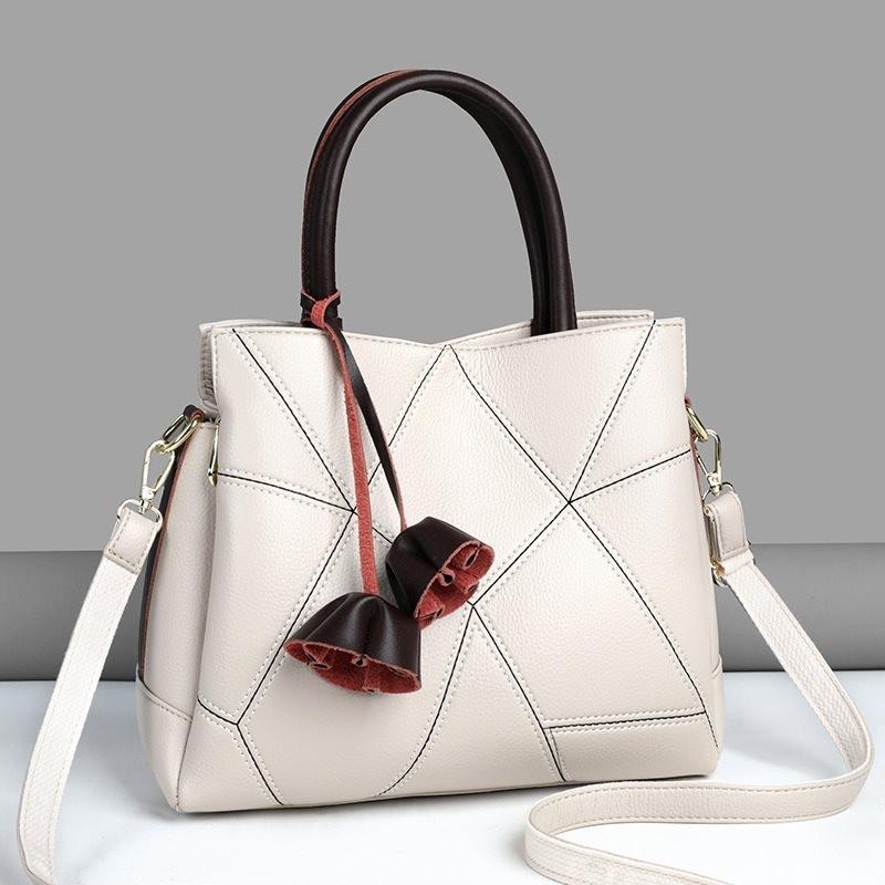 Stylish 2023 New Floral Tassel Women's Tote Bag With Large Capacity And Soft Pu Material In Black Beige And Red Colors