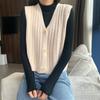 Knitted Vest, Short Top, Sleeveless Sweater Worn On Top A Small Woman with A Cardigan and A Camisole Shoulder