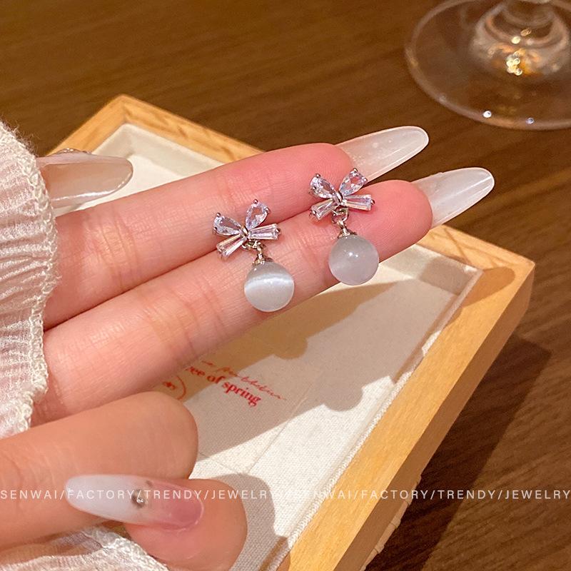 Micro-inlaid zircon bow earrings women s retro light luxury opal earrings, new exquisite earrings.