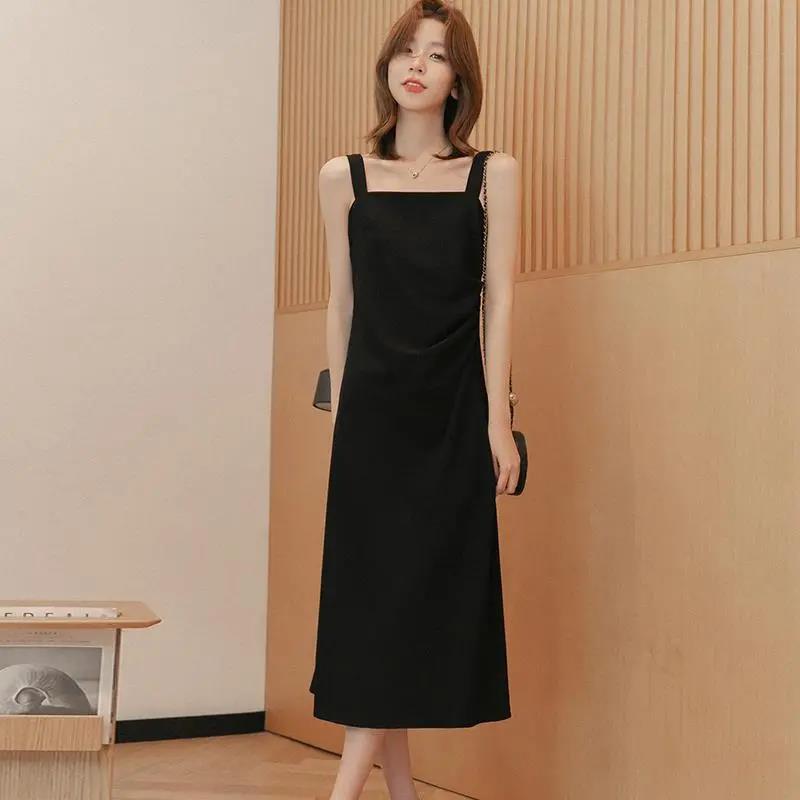 Small grain suspender dress women's spring and summer high-end small black dress covering meat and showing thinness small man long skirt