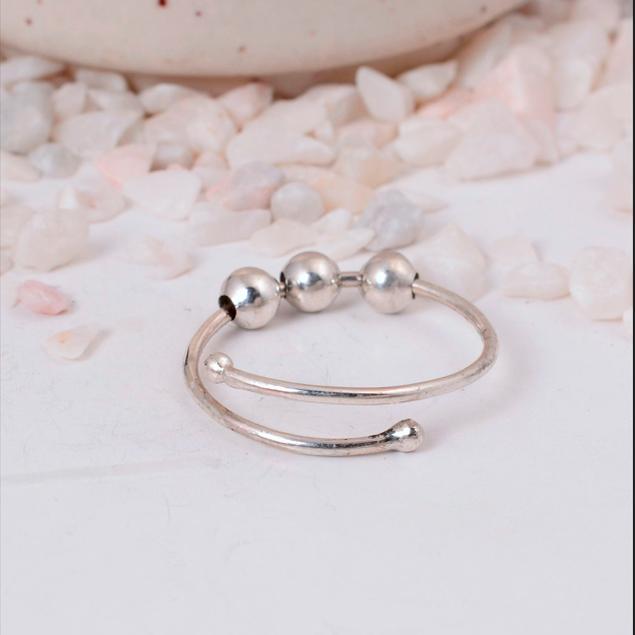 Adjustable Silver Fidget Ring: Minimalist anxiety jewelry with three movable spinner beads and a simple open wrap design.