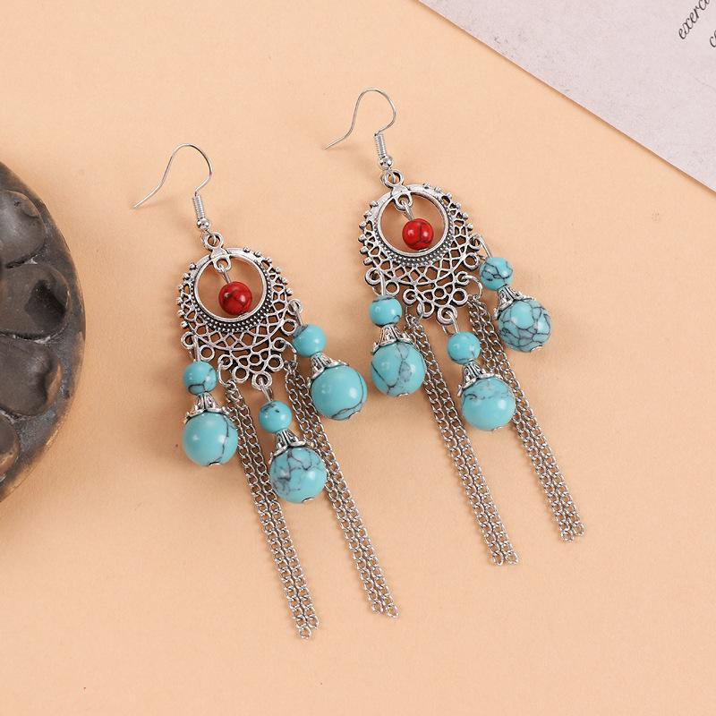 Turquoise fringed earrings women's exotic Tibetan long retro personalized earrings Chinese antique earrings