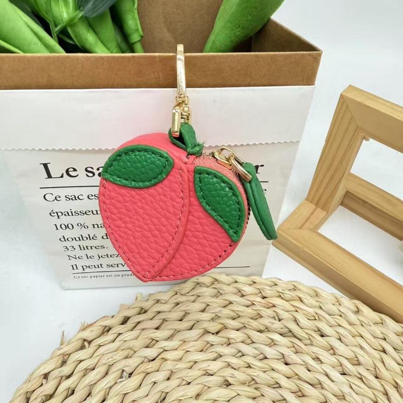 Creative fruit change bag, small peach leather change bag, mini hanging keychain earphone bag.