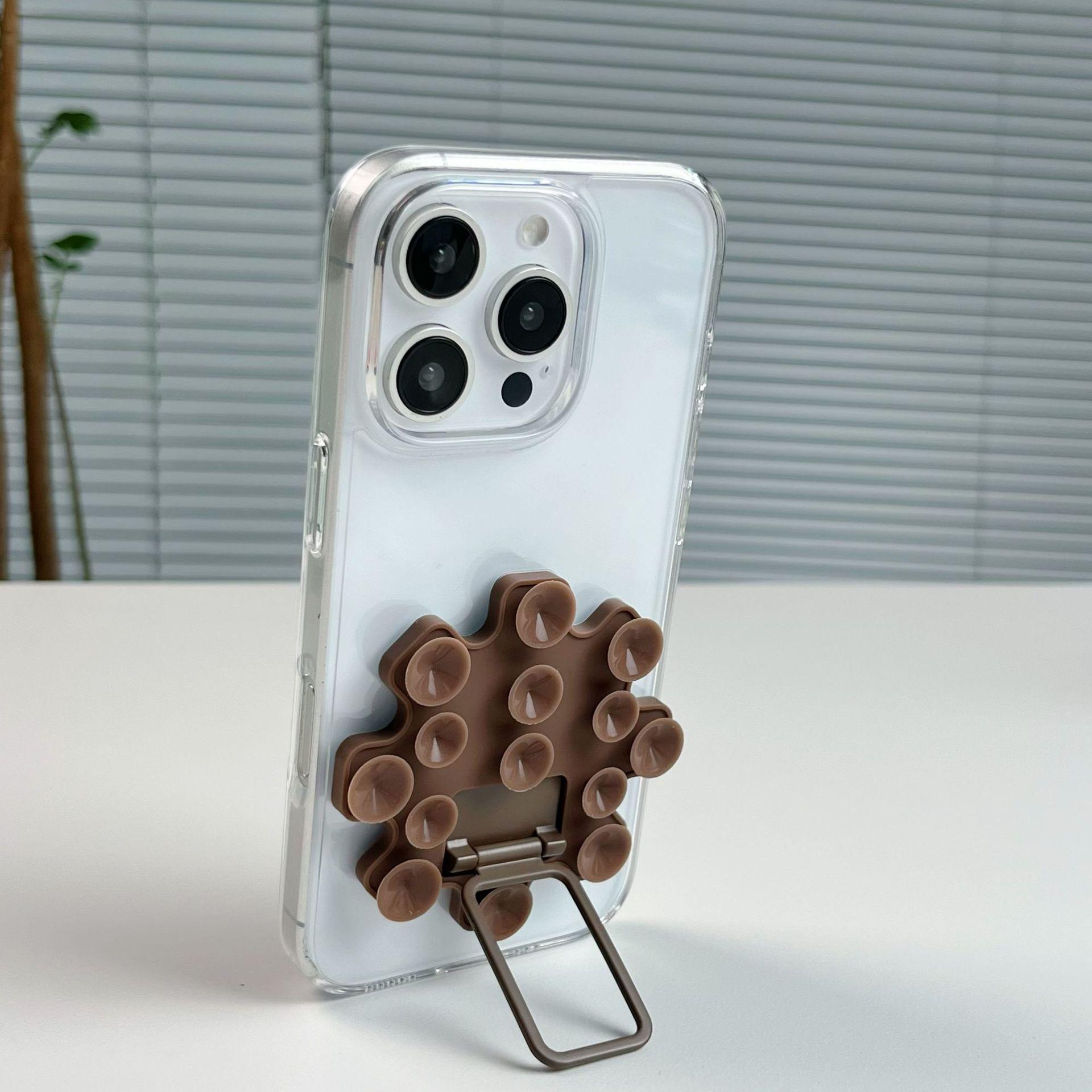 

Silicone Suction Phone Holder: Multifunctional, Folding, Non-Slip Desktop Stand