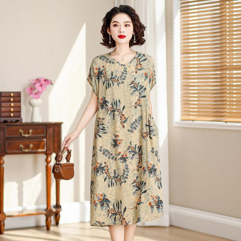 Nouvelle robe en coton et soie mode d'été pour femmes ample grande taille florale coton artificiel coton tempérament jupe moyenne et longue