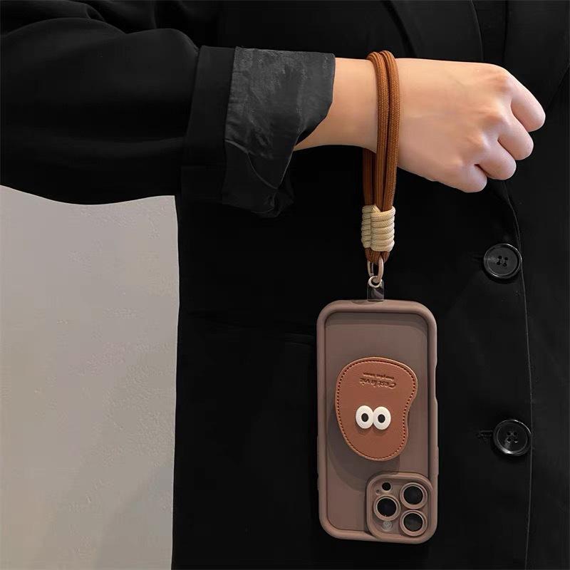 Eye-Shaped Airbag Bracket Phone Case with Crossbody Lanyard for iPhone 14, 15, 16 Pro Max.