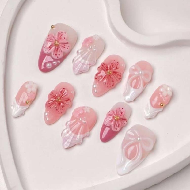 

30Pcs Elegant Nail Art Pieces Presenting Pearls And Flower Accents For Timeless Beauty 1