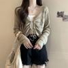 Summer V-neck hollow new slim-fitting and thin drawstring short outer knitted sweater women's thin solid color top