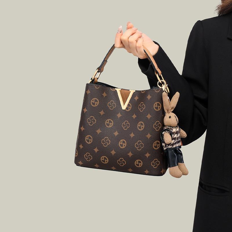 Borsa a secchiello da donna nuova borsa da donna borsa a tracolla messenger borsa a mano di alta gamma per pendolari con motivo floreale vecchio