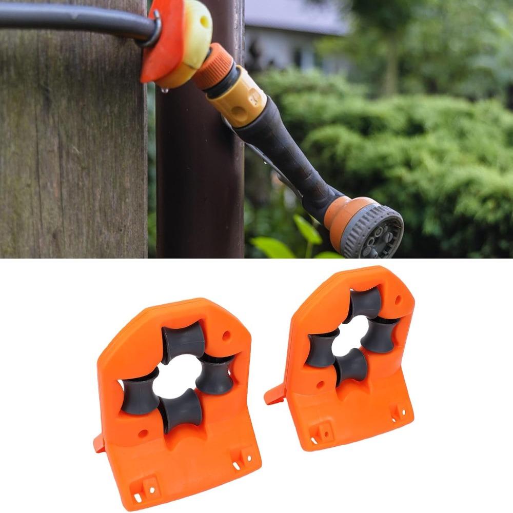 2PCS Plastic Garden Hose Holder Orange Wall Mount Hose Guide Hose Roller Guide Fence Hose Routing