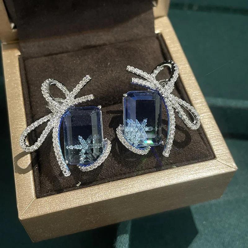 

New Ice Blue Crystal Bow Knot Earrings, Luxury and Popular Fashion Earrings, Earrings, Blue Feeling for Girls as a Gift