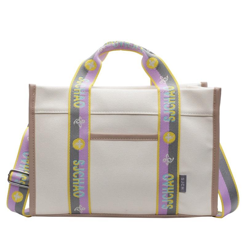 

Large-capacity student portable canvas bag 2025 new literary and simple shoulder bag broadband casual messenger tote bag One size