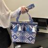 Large-capacity tote bag women's new fashion ethnic style student portable school bag foreign style fringed shoulder women's bag