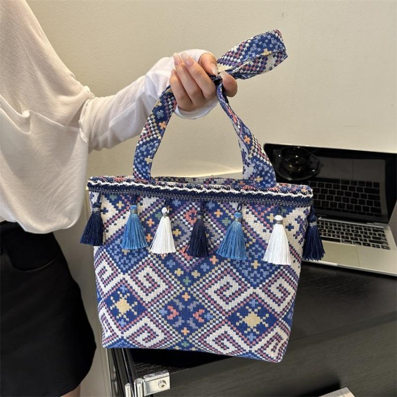 Large-capacity tote bag women's new fashion ethnic style student portable school bag foreign style fringed shoulder women's bag