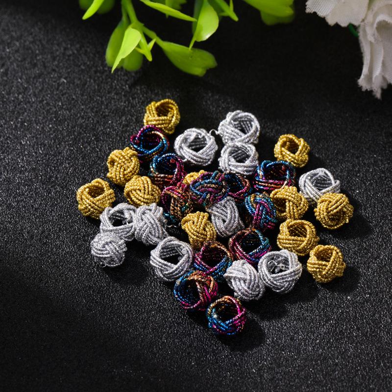 Exquisite Gold Ring with Wire Coil, Gold & Silver Buckle, and Woven Knot Ball