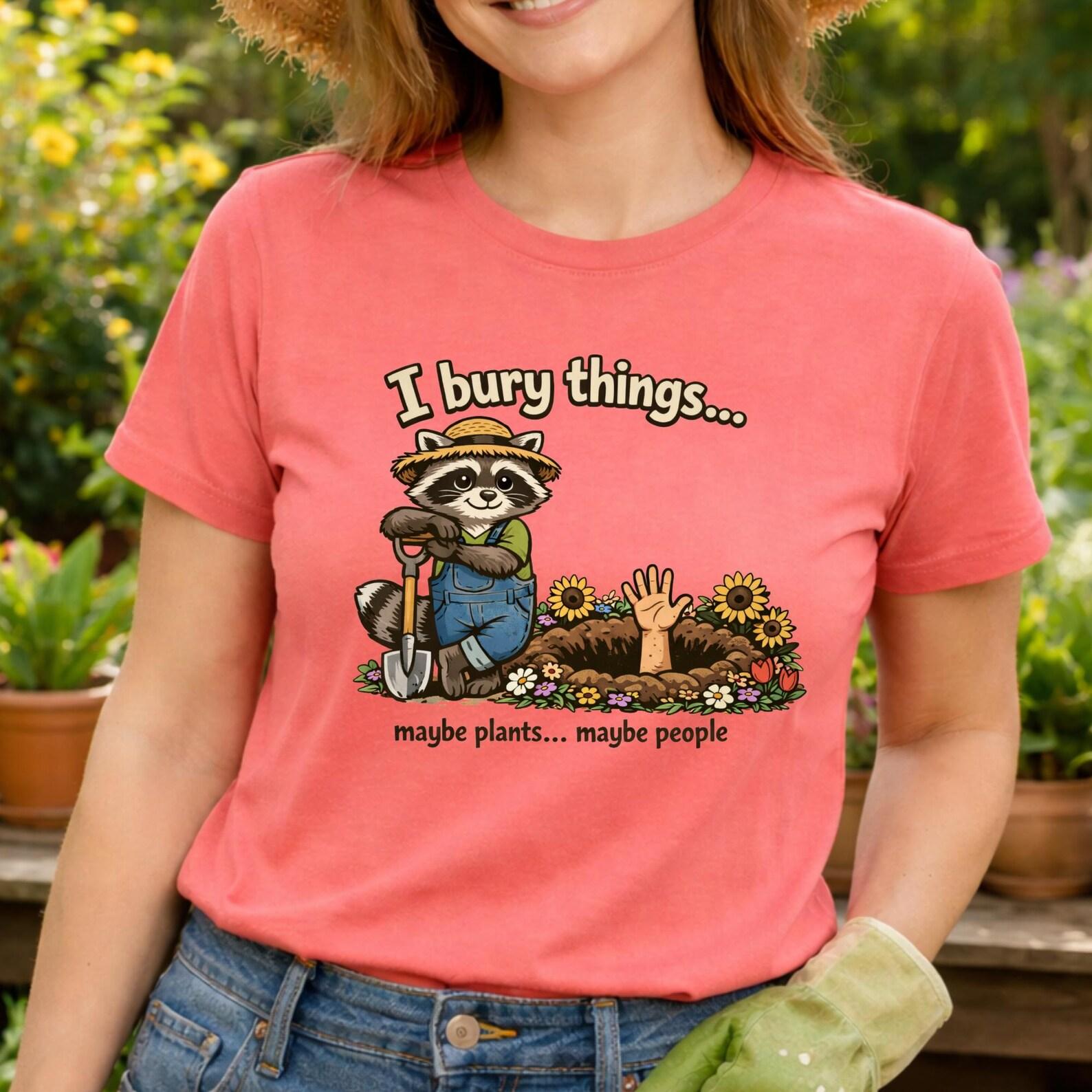 Funny Gardener Raccoon Shirt, I Bury Things Maybe Plants Maybe People, Dark Humor Gardening Shirt, Gift for Gardeners, Sunflower Garden Tee. S