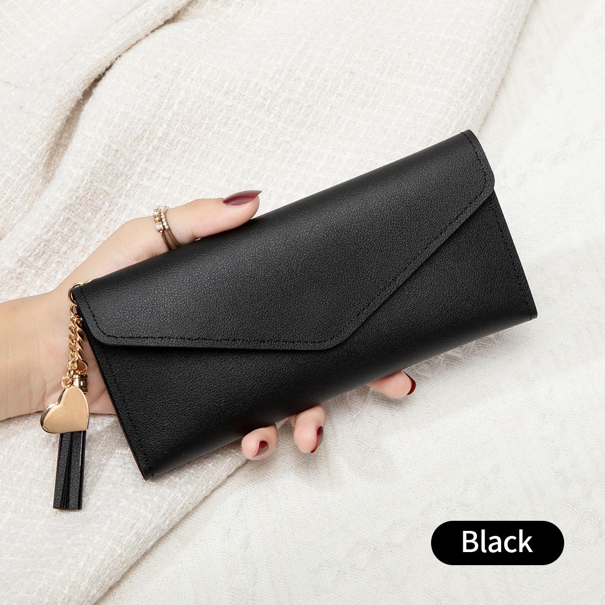 

Simple and stylish three fold women s wallet PU leather large capacity long wallet tassel pendant solid color wallet card bag