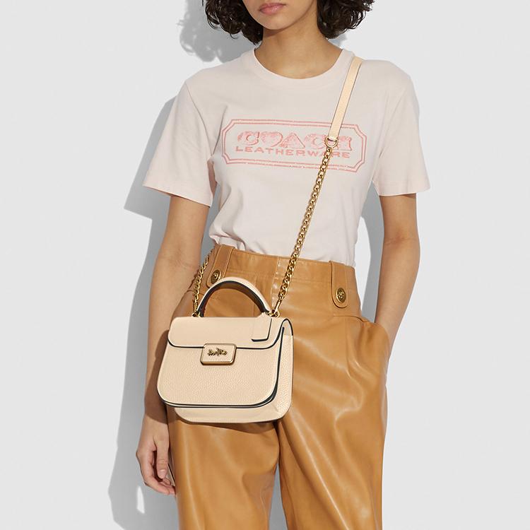 Coach Cream Pebbled Leather Top Handle Flap Crossbody Bag with Vintage Gold Hardware for Daily Use