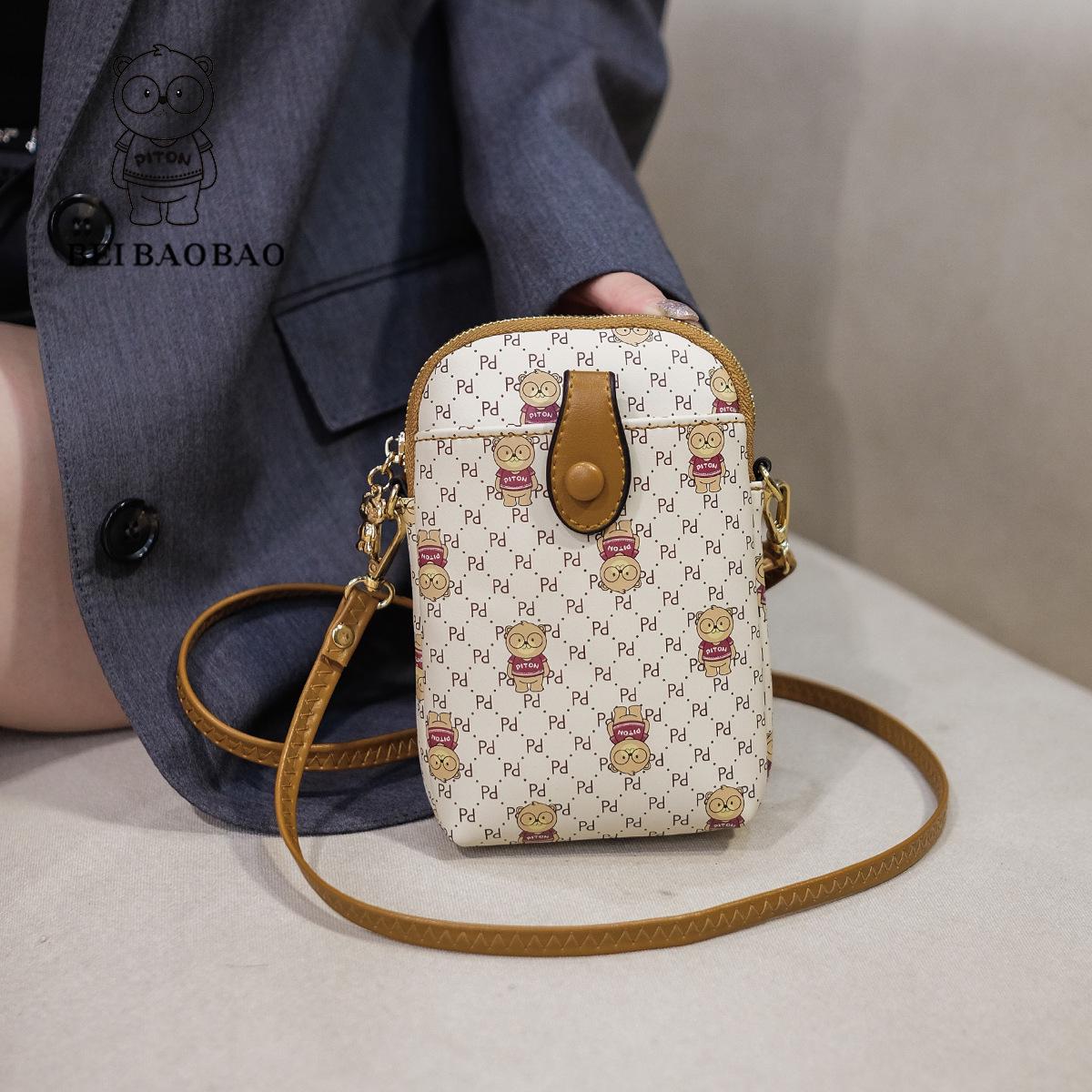 

2025 Женская маленькая сумка кроссбоди - Модная, легкая, универсальная нишевая сумка для телефона слоновая кость