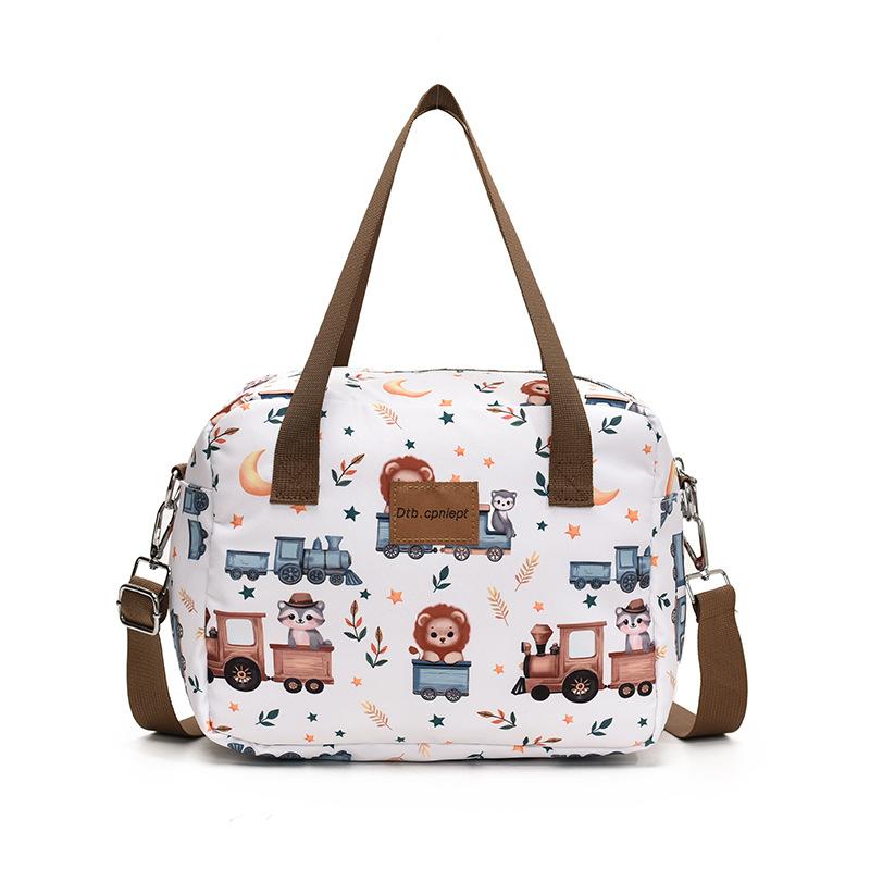 Single-shoulder slanted crossbody baby bag, cute cartoon design, large capacity, water-resistant, suitable for moms to carry out