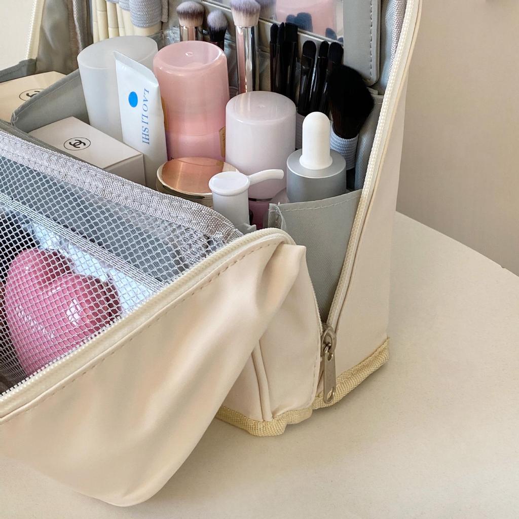 Portable Large Capacity Makeup Bag with Mirror, Hangable on Suitcase, Compartmentalized Cosmetic Storage Pouch.