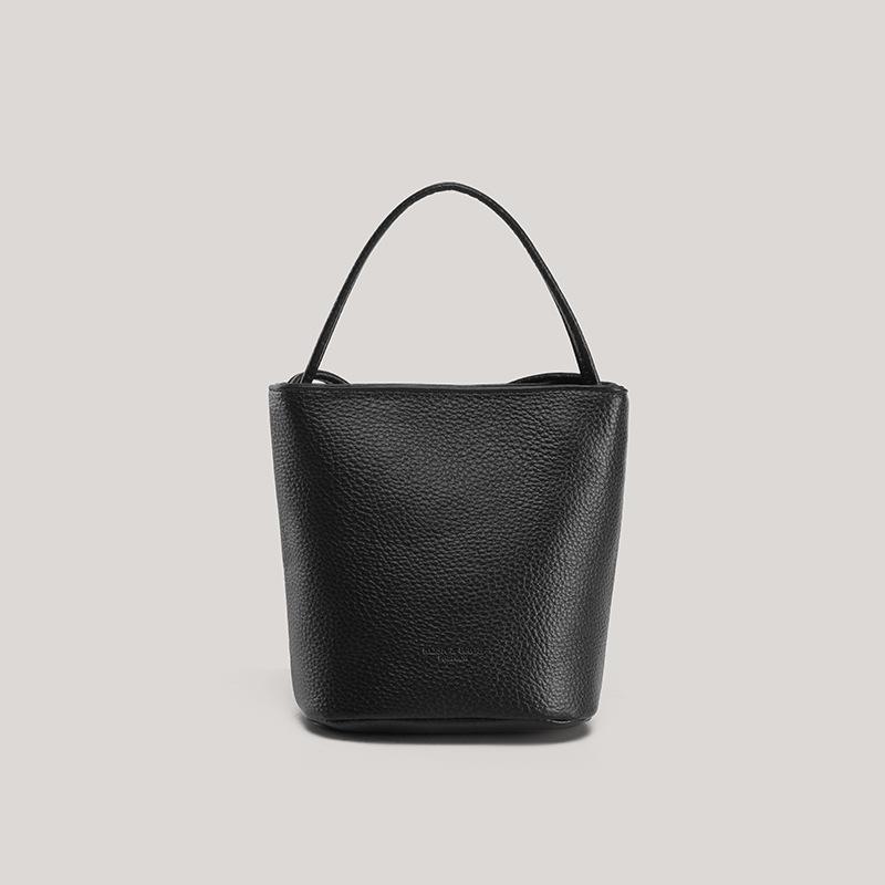 

Hand carrying bucket bag women 2025 new Korean version of simple casual shoulder bag niche trend versatile design underarm bag