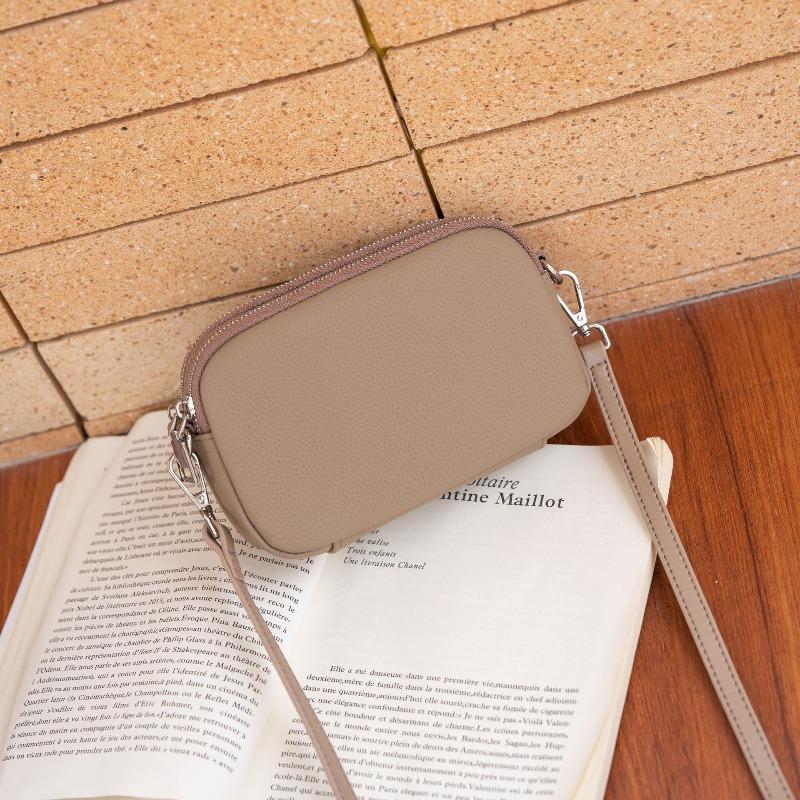 

Togo first layer cowhide niche women s bag single shoulder messenger bag simple multi-compartment women s bag zipper square bag soft leather