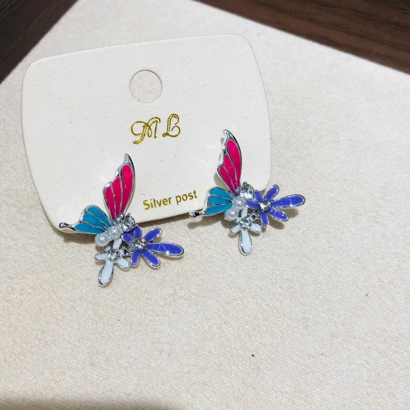 Fashiona Super Fairy Temperament Diamond Studded Pearl Dripping Butterfly Earrings Women Luxury Niche Versatile Earrings