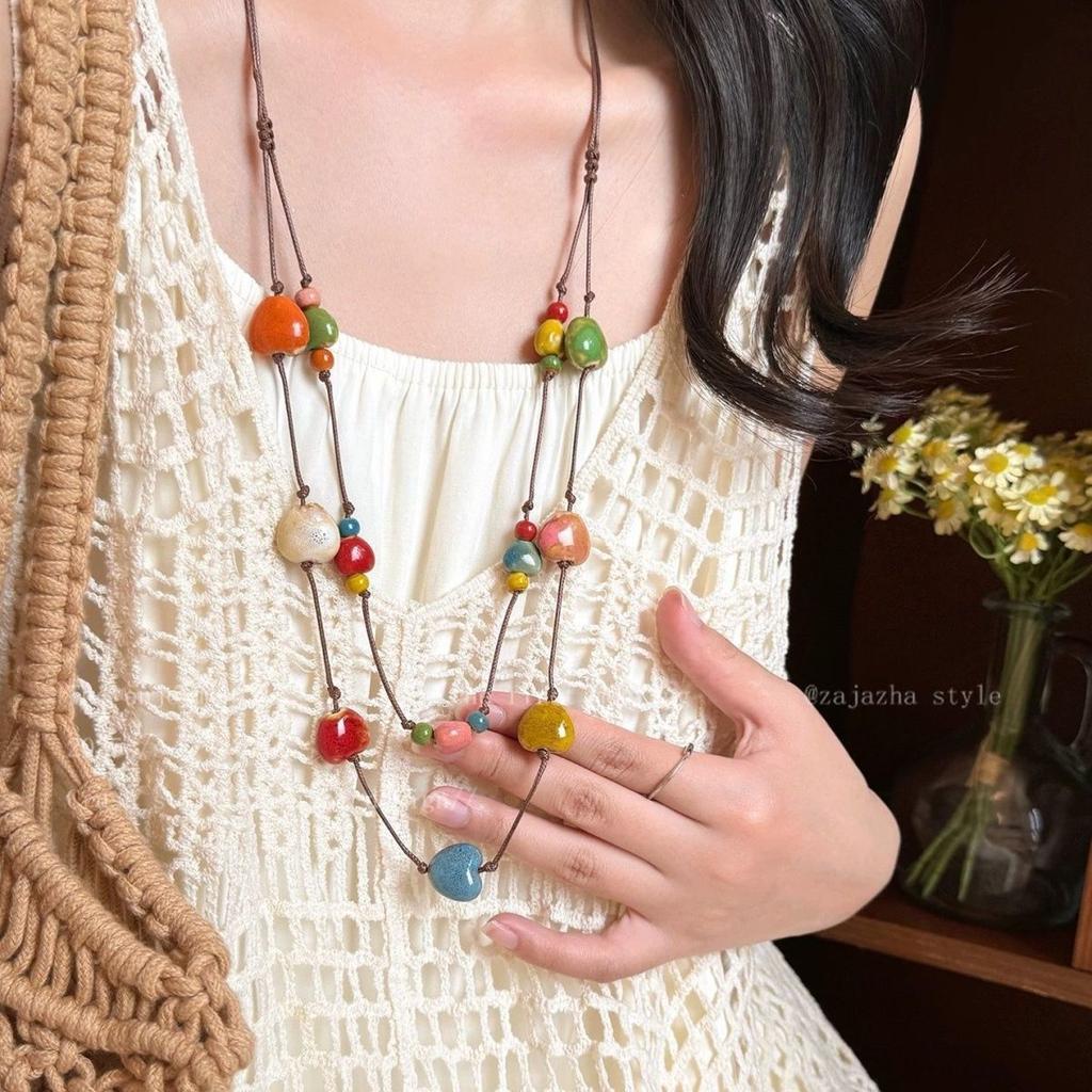 Retro pendant, ethnic style ceramic butterfly bell necklace, women's new trendy long sweater chain with accessories