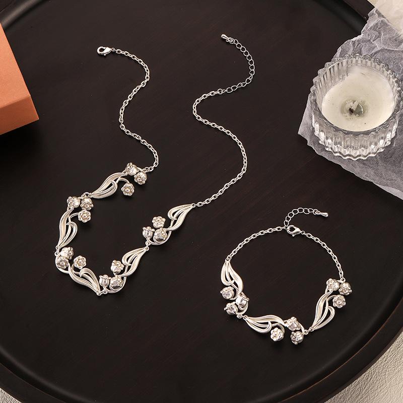 

Elegant French Retro Lily of the Valley Jewelry Set: Earrings, Necklace, Bracelet