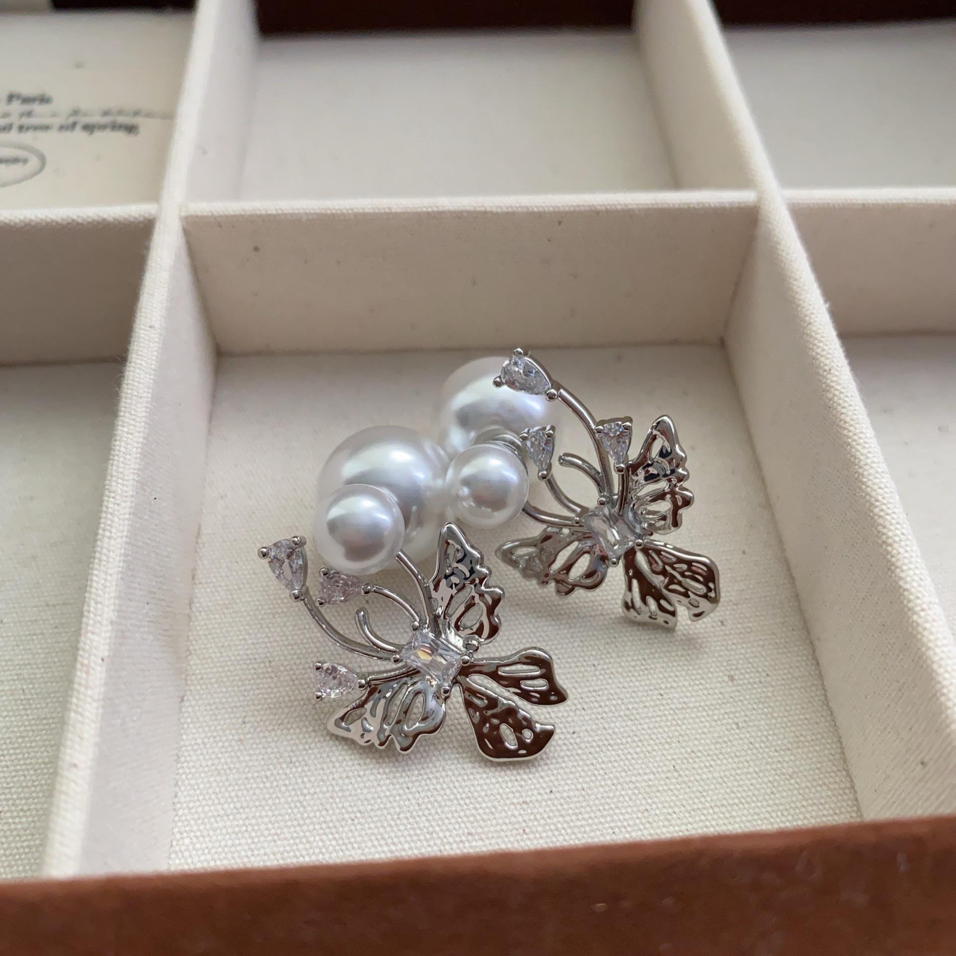 

New smart hollow butterfly pearl stud earrings light luxury niche design exquisite fashion versatile high sense earrings women