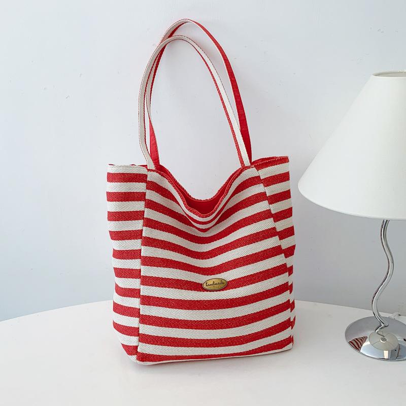 

Вместительная двусторонняя сумка-тоут женская 2025 новая полосатая на плечо портативная красный