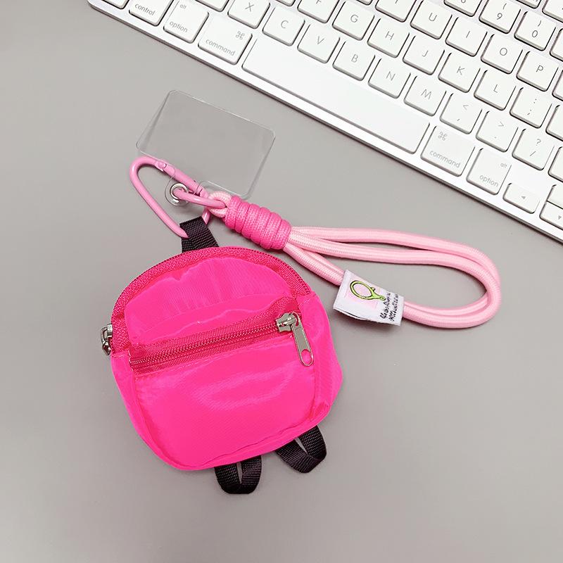 Double-layered small schoolbags, coin purses, phone cases, backpacks, pendants, and earphone covers are all universal