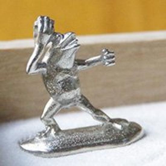 A miniature tin frog from the Choju Jinbutsu Giga perfect for your dry landscape painting, garden.