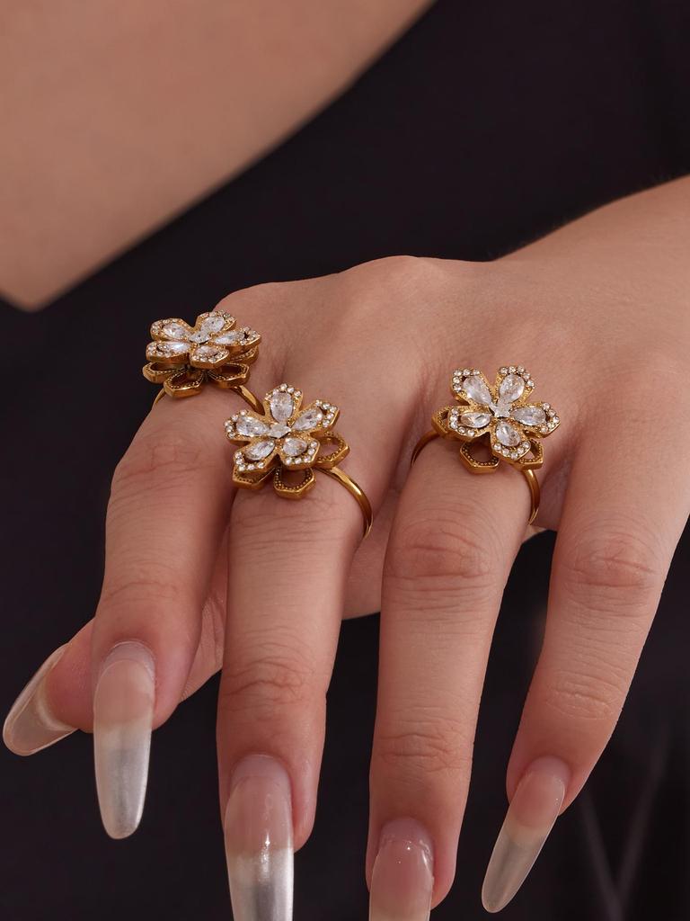 Oumika Oumei Five-Petal Zircon 360° Rotating Jewelry Set: 18K Gold-Plated Earrings, Ring, and Necklace.