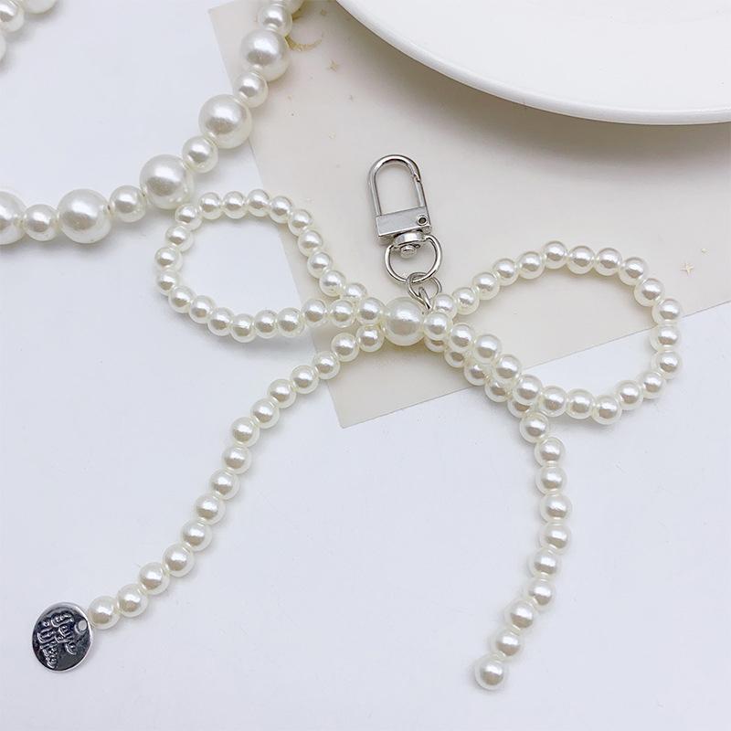 

Простая подвеска в виде жемчуга с бантом для телефона, брелки для ключей, подвеска для сумки, украшения для девочек, аксессуары, подарки