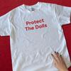 Protect The Dolls Baby Tee – Trans Rights Are Human Rights Shirt and Kids Tshirt – LGBTQ+ Empowerment Pride Top