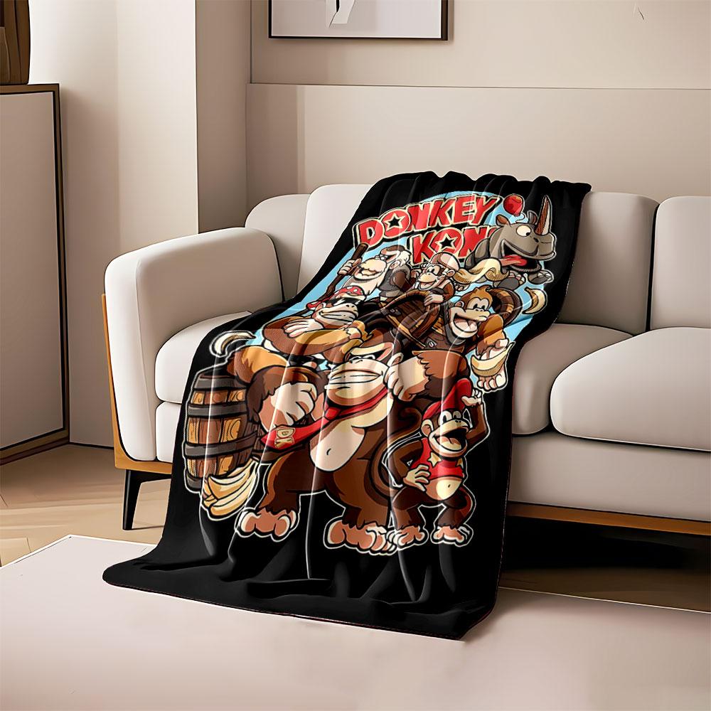 

Cartoon gorillas, barrels, bananas, and a rhino with Donkey Kong title. for all seasons blanket lunch break throw gift 80cm x 120cm