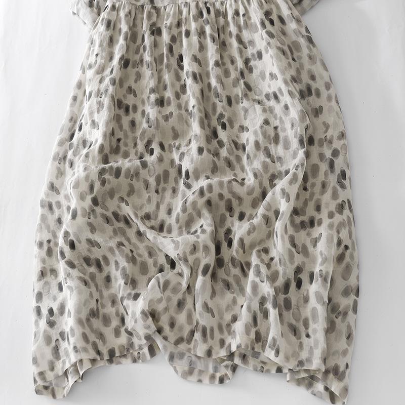 In the Summer of 2025, the New Printed Cotton and Linen Dress for Women's Loose and Thin Seven-quarter-sleeved V-neck Big Pendulum Long Skirt