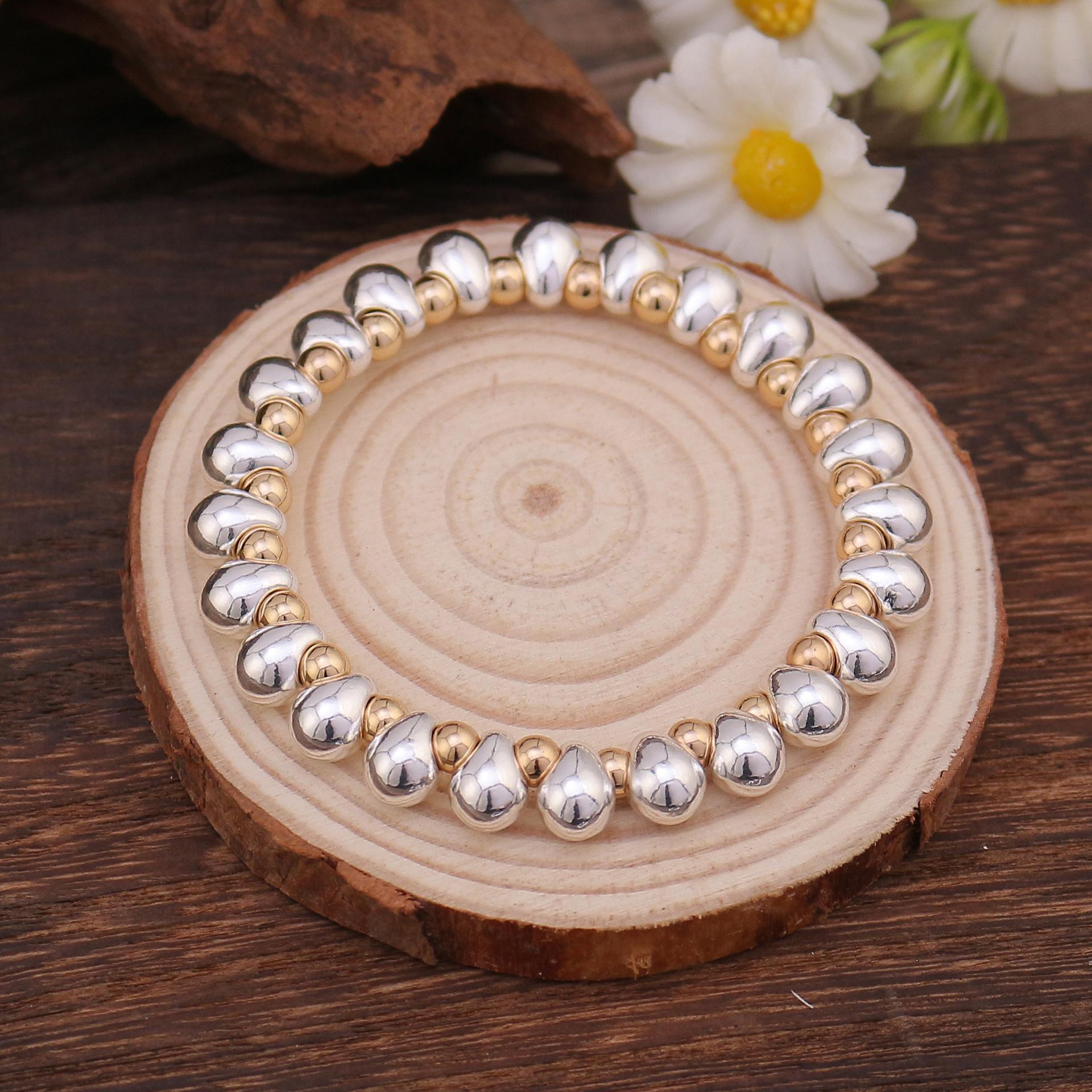 

Браслет из экологичного сплава с бусинами в форме капли воды, гальваническое золотое покрытие, комбинация «вороненая сталь», эластичный браслет-веревка женский Elastic Adjustable