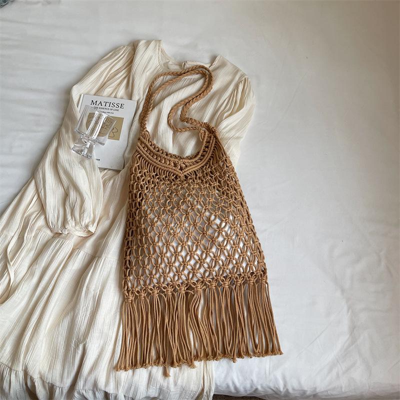 

Сумка ручной работы из хлопковой нити, вязаная, лето 2025, новая, простая, в зарубежном стиле, на плечо, подмышку, плетеная из соломы, ажурная пляжная сумка