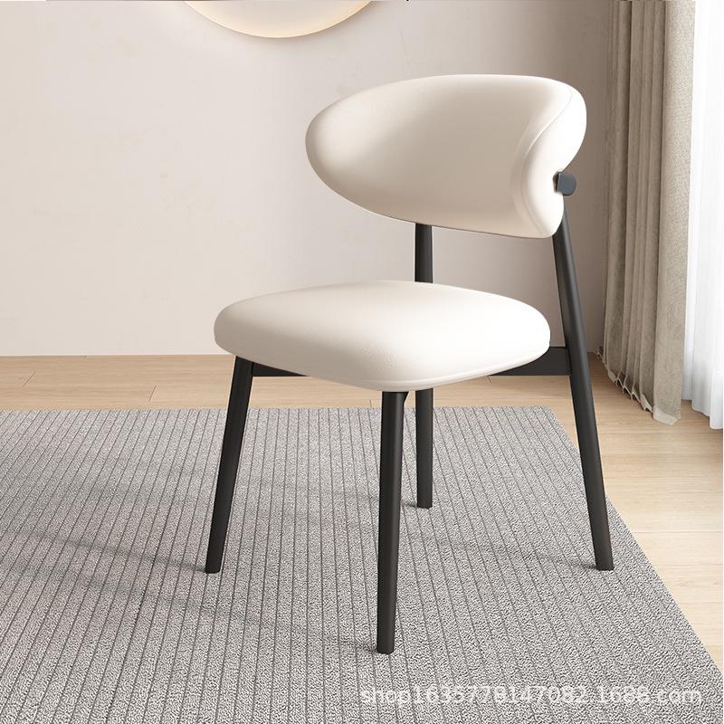 Nordic Modern Minimalist Solid Wood Dining Chair with Soft Pack Backrest - Comfortable Light Luxury Ram's Horn Design for Home, Restaurant, and Hotel.