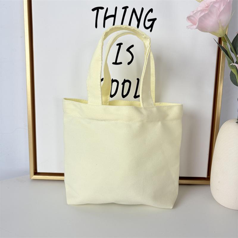 

Solid Color Simple Lunch Bag Portable Canvas Small Cloth Bag Portable Canvas Bag Sundries Storage Bag