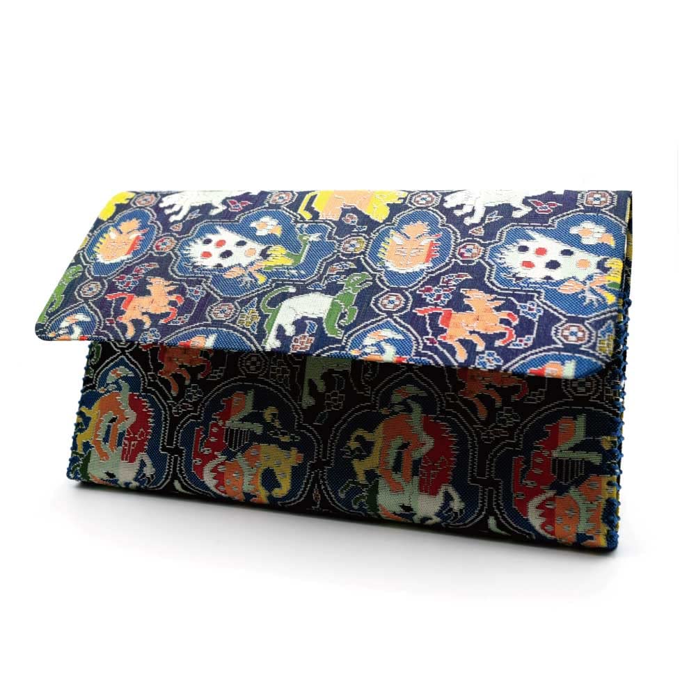 

Трехслойная шелковая ткань с ножницами и карманным бумажным футляром, с дизайном «птица, терзающая льва» и животным мотивом, производства Tatsumura Textiles, и