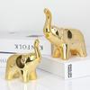 Elegant Ceramic Elephant Figurine As A Decorative Accent For Home And Office Spaces