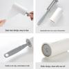 Sticky Lint Roller Brush with Tear-Off Sheets: Removes Hair from Sweaters and Clothes, Includes Replacement Roll.